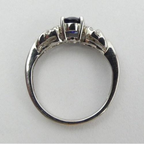 90A - 18ct white gold sapphire and diamond ring, 3 grams. Size K 1/2, 5.4 mm wide. UK Postage £12.