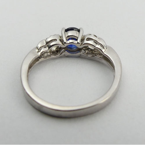 90A - 18ct white gold sapphire and diamond ring, 3 grams. Size K 1/2, 5.4 mm wide. UK Postage £12.