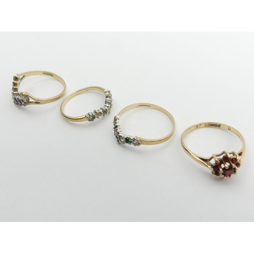 96 - Four stone set 9ct gold rings, 5.1 grams. UK Postage £12.