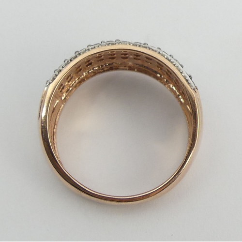 97 - 9ct rose gold white and chocolate diamond ring, 4.2 grams. Size N, 9.4 mm wide. UK Postage £12.