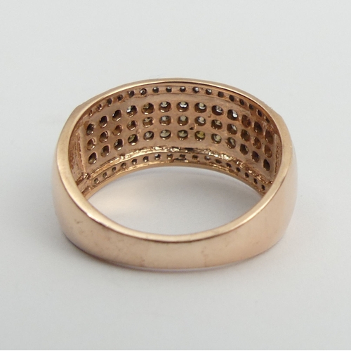 97 - 9ct rose gold white and chocolate diamond ring, 4.2 grams. Size N, 9.4 mm wide. UK Postage £12.