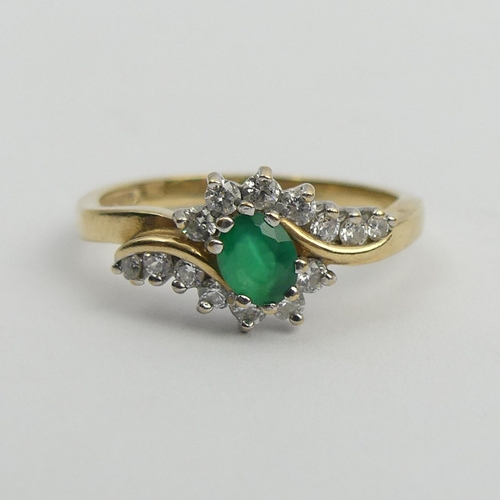 98 - 9ct gold green and white stone ring, 2.6 grams. Size P, 9 mm wide. UK Postage £12.