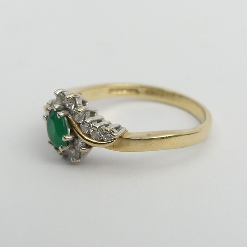 98 - 9ct gold green and white stone ring, 2.6 grams. Size P, 9 mm wide. UK Postage £12.