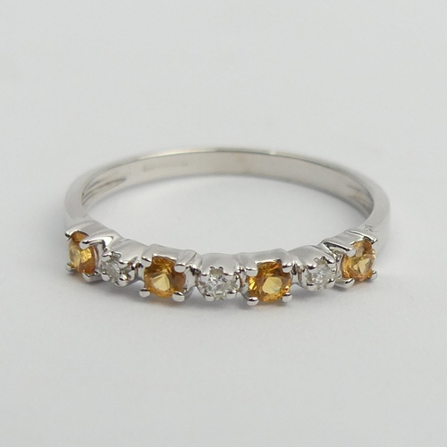 99 - 9ct white gold yellow topaz and diamond ring, 1.4 grams. Size N, 2.9 mm wide. UK Postage £12.