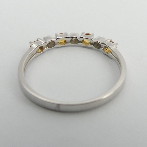 99 - 9ct white gold yellow topaz and diamond ring, 1.4 grams. Size N, 2.9 mm wide. UK Postage £12.