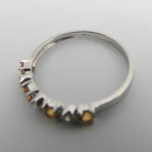 99 - 9ct white gold yellow topaz and diamond ring, 1.4 grams. Size N, 2.9 mm wide. UK Postage £12.