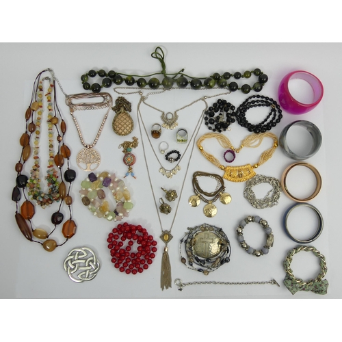 119 - A basket of costume jewellery including bead necklaces. UK Postage £12.