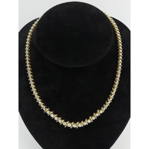 125 - 14ct gold diamond collarette necklace total diamond weight approx 5 carats. UK Postage £12.