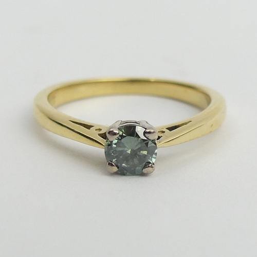 127 - 18ct gold blue diamond solitaire approx 1/4ct, 2.5 grams. Size J, 4.5 mm. UK Postage £12.