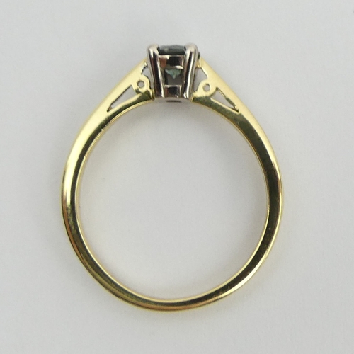 127 - 18ct gold blue diamond solitaire approx 1/4ct, 2.5 grams. Size J, 4.5 mm. UK Postage £12.