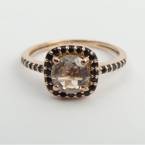 128 - 10ct rose gold pale pink tourmaline and black quartz ring, 1.6 grams. Size J 1/2, 8.5 mm wide. UK Po... 