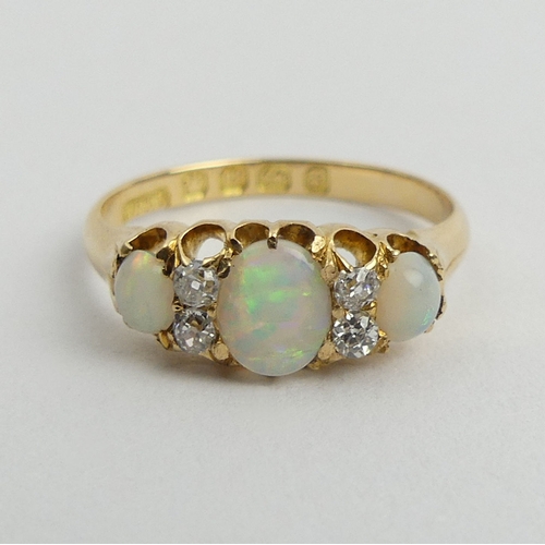 131 - Victorian 18ct gold opal and diamond ring, Birm.1889, 2.9 grams. Size N, 6.8 mm. UK Postage £12.