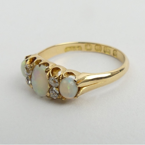 131 - Victorian 18ct gold opal and diamond ring, Birm.1889, 2.9 grams. Size N, 6.8 mm. UK Postage £12.