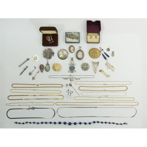 137 - A box of jewellery including a Victorian silver locket, a gold mounted brooch and silver items. UK P... 