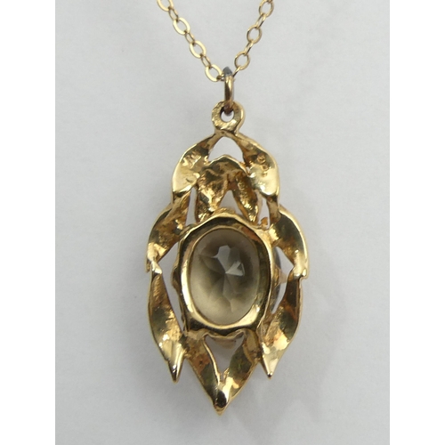 141 - 9ct gold smokey quartz pendant and chain, 3.2 grams. Chain 42 cm, pendant 2.5 cm. UK Postage £12.