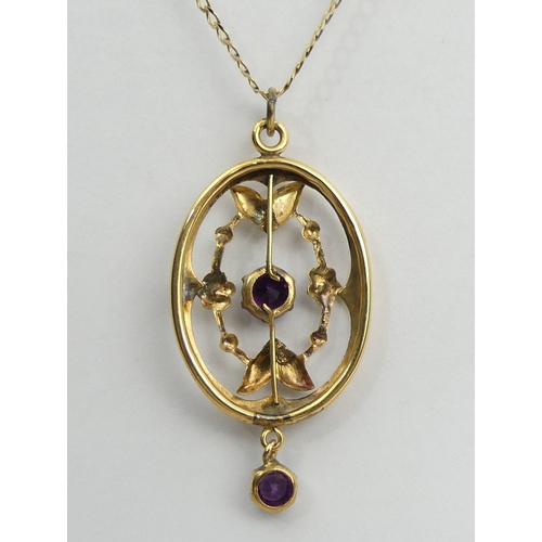 142 - 9ct gold paste set pendant and chain, 2.8 grams. Chain 46 cm, pendant 38 mm. UK Postage £12.