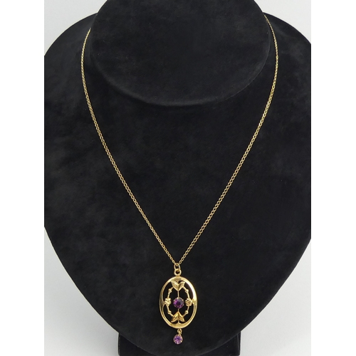 142 - 9ct gold paste set pendant and chain, 2.8 grams. Chain 46 cm, pendant 38 mm. UK Postage £12.