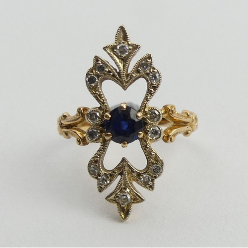 144 - 18ct gold (tested) sapphire and diamond dress ring, 4.5 grams. Size N, 25 mm wide. UK Postage £12.