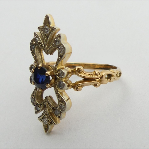 144 - 18ct gold (tested) sapphire and diamond dress ring, 4.5 grams. Size N, 25 mm wide. UK Postage £12.