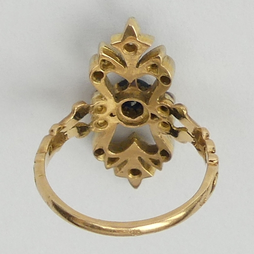 144 - 18ct gold (tested) sapphire and diamond dress ring, 4.5 grams. Size N, 25 mm wide. UK Postage £12.