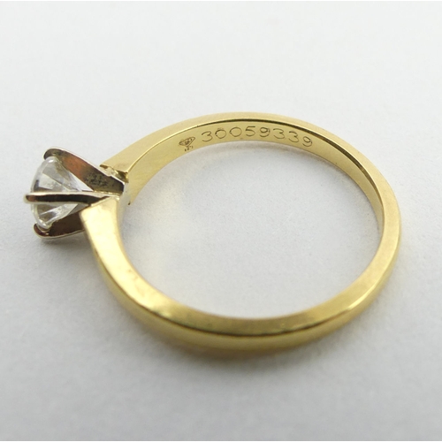 145 - 18ct gold solitaire diamond ring approx. 1/3 ct, 2.9 grams. Size L, 4.85 mm. UK Postage £12.