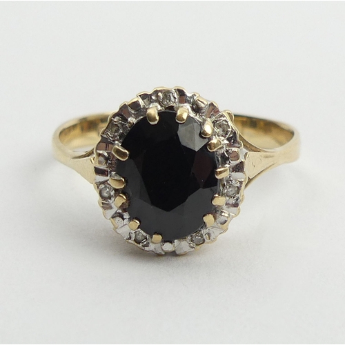 146 - 9ct gold sapphire and diamond ring, 3.7 grams. Size Z, 13.3 mm. UK Postage £12.