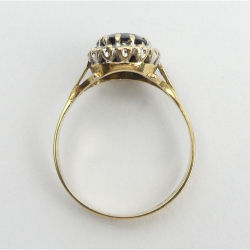 146 - 9ct gold sapphire and diamond ring, 3.7 grams. Size Z, 13.3 mm. UK Postage £12.