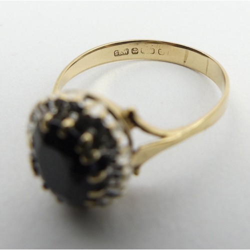 146 - 9ct gold sapphire and diamond ring, 3.7 grams. Size Z, 13.3 mm. UK Postage £12.