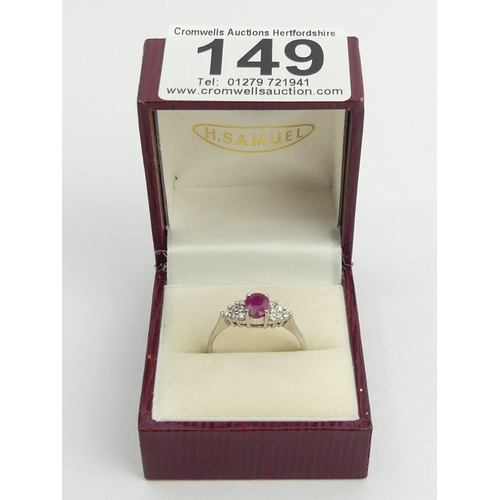 149 - 18ct white gold ruby and diamond ring, 3.5 grams. Size Q 1/2, 6 mm wide. UK Postage £12.