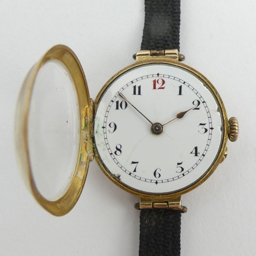 164 - A 9ct gold Red 12 wristwatch, London import mark 1913. 17.5 grams gross. 28 mm wide. UK Postage £12.... 