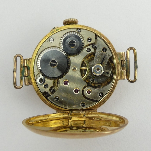 164 - A 9ct gold Red 12 wristwatch, London import mark 1913. 17.5 grams gross. 28 mm wide. UK Postage £12.... 