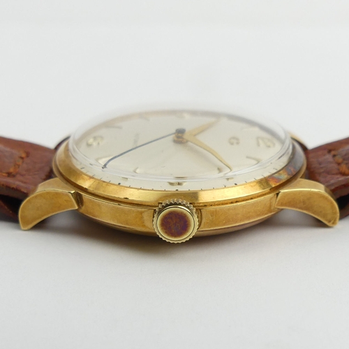 168 - Garrard 18ct gold automatic movement watch. 35 mm wide.  UK Postage £12.
Condition report: In workin... 