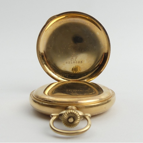 170B - An Elgin gold plated full hunter pocket watch, 70 x 50 mm. UK Postage £12.