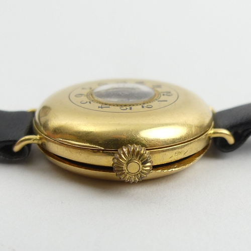 172 - 18ct gold half hunter wristwatch, 24.9 grams gross. 30 mm wide. UK Postage £12. 
Condition report: N... 