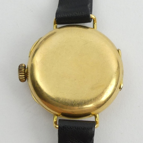 172 - 18ct gold half hunter wristwatch, 24.9 grams gross. 30 mm wide. UK Postage £12. 
Condition report: N... 