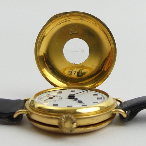 172 - 18ct gold half hunter wristwatch, 24.9 grams gross. 30 mm wide. UK Postage £12. 
Condition report: N... 