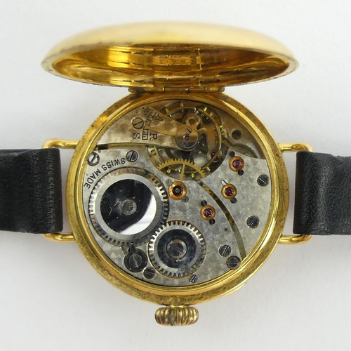 172 - 18ct gold half hunter wristwatch, 24.9 grams gross. 30 mm wide. UK Postage £12. 
Condition report: N... 