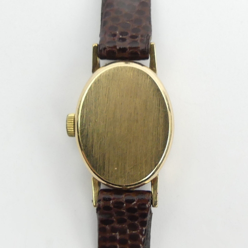 174 - 9ct gold ladies Omega manual wind watch, 16.5 mm wide. UK Postage £12.