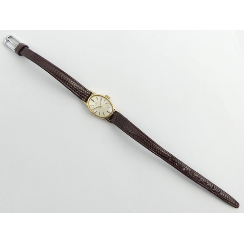 174 - 9ct gold ladies Omega manual wind watch, 16.5 mm wide. UK Postage £12.