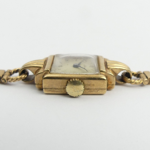 176 - 9ct gold ladies wristwatch and strap, 16.4 grams gross. Watch 17 mm wide. UK Postage £12.