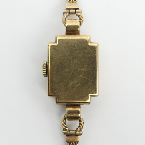 176 - 9ct gold ladies wristwatch and strap, 16.4 grams gross. Watch 17 mm wide. UK Postage £12.