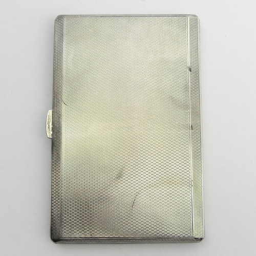 205 - Elizabeth II silver cigarette case, Birm.1959. 188.8 grams. 127 x 85 mm. UK Postage £12.