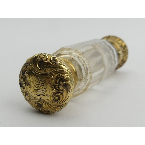 205B - Victorian double ended gilt metal and glass perfume bottle. 9.5 cm. UK Postage £12.