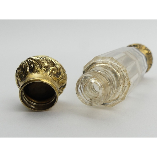 205B - Victorian double ended gilt metal and glass perfume bottle. 9.5 cm. UK Postage £12.