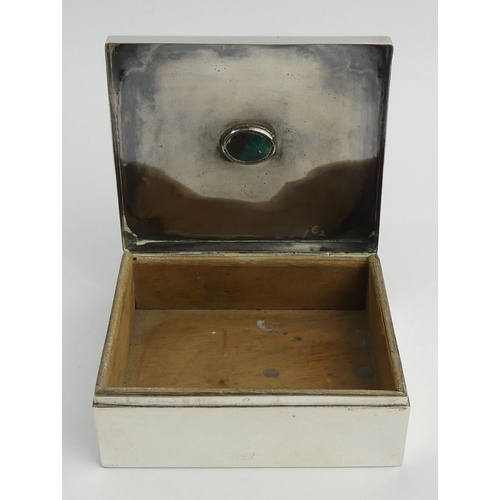 209 - Sterling silver cigarette box with cabochon stone mount. 239 grams. 10 x 8.5 x 4. UK Postage £12.