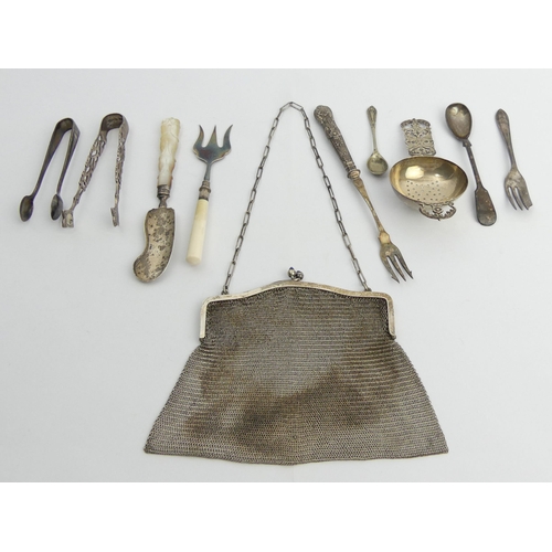 218 - Samuel Pemberton silver and abalone butter knife, a pair of silver sugar tongs, a silver tea straine... 