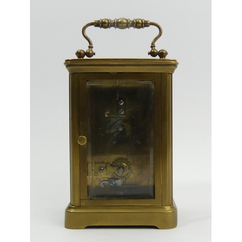 253 - A late 19th century brass cased carriage clock. 14.5 cm high. UK Postage £12.