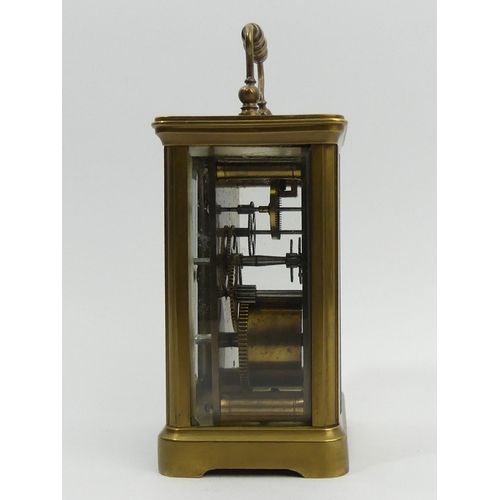 253 - A late 19th century brass cased carriage clock. 14.5 cm high. UK Postage £12.