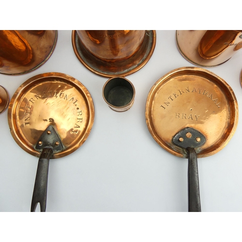 261 - A 19th century set of copper measures, two copper sauce pan lids and a single handled 25.5 cm jug 