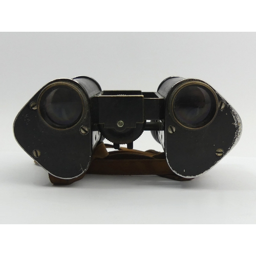 262 - A pair of leather cased binoculars C.P Gore Berlin. 11.2 cm. UK Postage £12.